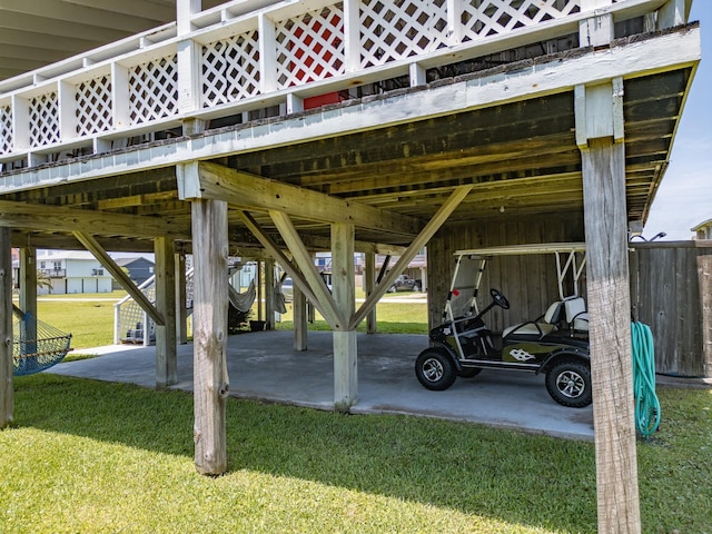 16519 Captain Kidd Rd, Jamaica Beach, TX 77554 - view of parking featuring a carport
