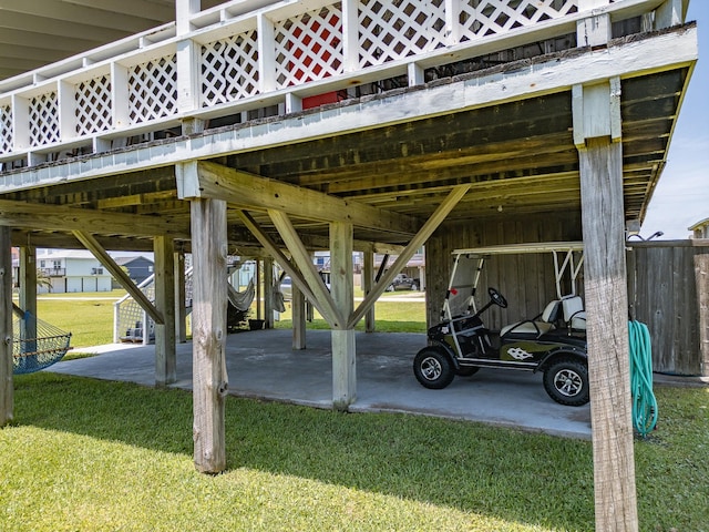 16519 Captain Kidd Rd, Jamaica Beach, TX 77554 - view of parking / parking lot featuring a carport