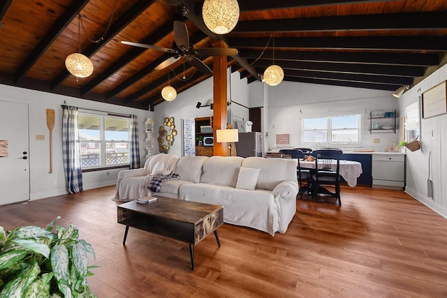 16519 Captain Kidd Rd, Jamaica Beach, TX 77554 - living room with light wood finished floors, wood ceiling, healthy amount of natural light, and ceiling fan