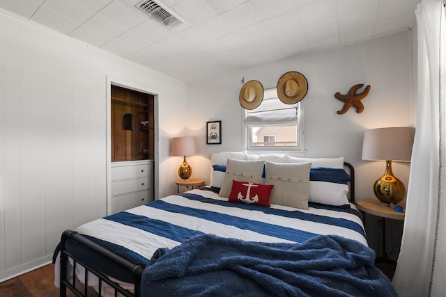 16519 Captain Kidd Rd, Jamaica Beach, TX 77554 - bedroom featuring wood finished floors