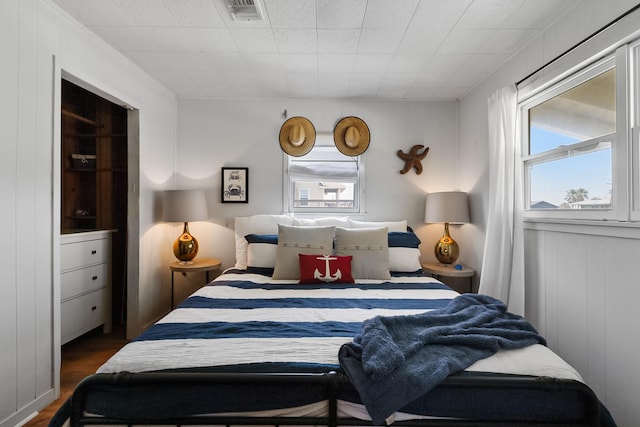 16519 Captain Kidd Rd, Jamaica Beach, TX 77554 - bedroom featuring wood finished floors