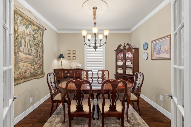 231 Ranch House Ln, Richmond, TX 77469 - dining room featuring dark wood-style floors, a chandelier, and crown molding
