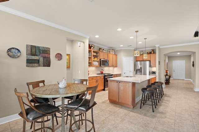 231 Ranch House Ln, Richmond, TX 77469 - kitchen featuring stainless steel appliances, arched walkways, crown molding, open shelves, and recessed lighting