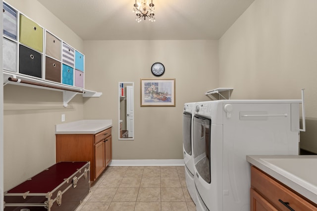 231 Ranch House Ln, Richmond, TX 77469 - laundry room with separate washer and dryer, cabinet space, and light tile patterned floors