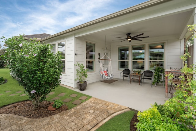 231 Ranch House Ln, Richmond, TX 77469 - view of patio featuring ceiling fan