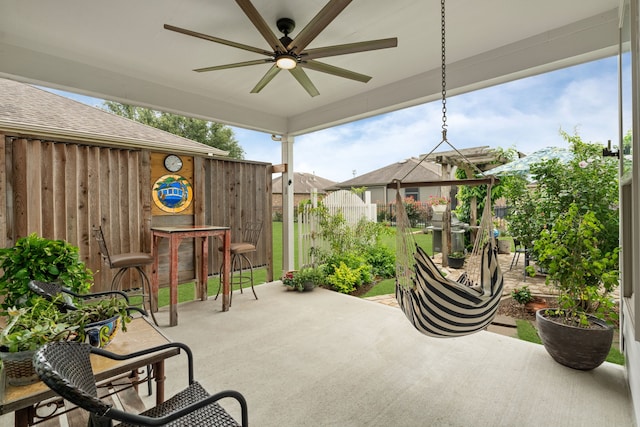 231 Ranch House Ln, Richmond, TX 77469 - fenced backyard with ceiling fan and a patio