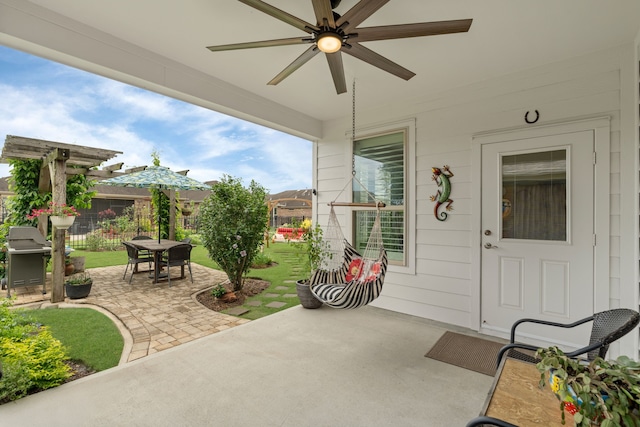 231 Ranch House Ln, Richmond, TX 77469 - view of patio with a ceiling fan, outdoor dining area, and grilling area