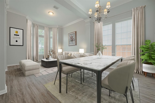 14410 Ayers Rock Rd, Sugar Land, TX 77498 - dining space featuring a chandelier, wood finished floors, crown molding, and baseboards