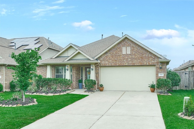 2947 Twin Cove Ct, Conroe, TX 77301 - view of front of house featuring brick siding, an attached garage, and concrete driveway