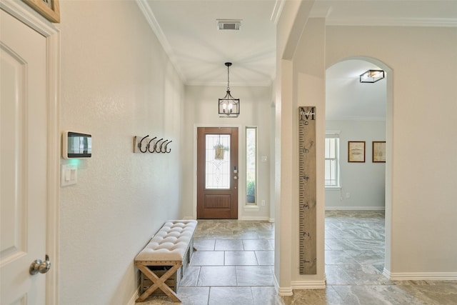 2947 Twin Cove Ct, Conroe, TX 77301 - foyer with arched walkways and crown molding