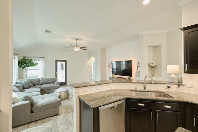 2947 Twin Cove Ct, Conroe, TX 77301 - kitchen with dishwasher, open floor plan, a peninsula, light stone counters, and lofted ceiling