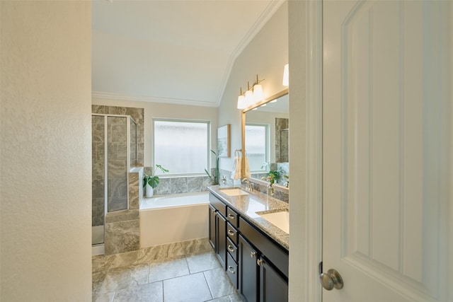 2947 Twin Cove Ct, Conroe, TX 77301 - bathroom featuring crown molding, lofted ceiling, a garden tub, a stall shower, and double vanity