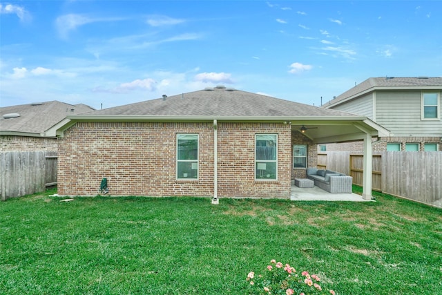 2947 Twin Cove Ct, Conroe, TX 77301 - rear view of house with brick siding, a fenced backyard, a patio, and a ceiling fan