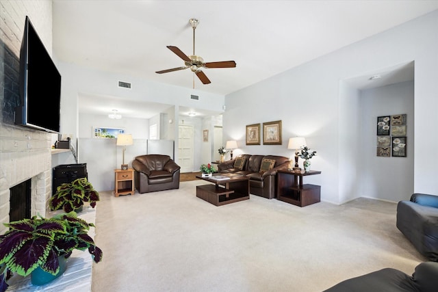 1939 Ash Meadow Dr, Houston, TX 77090 - carpeted living area with a fireplace and ceiling fan