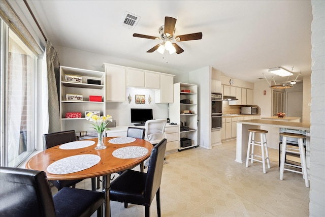 1939 Ash Meadow Dr, Houston, TX 77090 - dining space featuring a ceiling fan