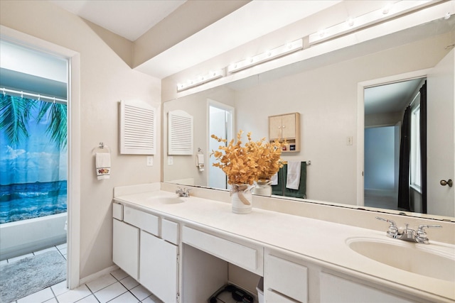 1939 Ash Meadow Dr, Houston, TX 77090 - bathroom featuring double vanity, tile patterned flooring, baseboards, and shower / bath combo with shower curtain