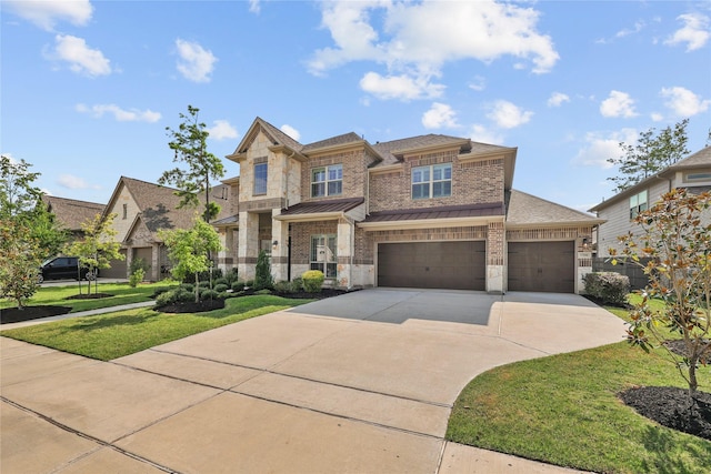 17346 Camillia Trl, Conroe, TX 77302 - view of front of property with concrete driveway, stone siding, a standing seam roof, a front yard, and a shingled roof