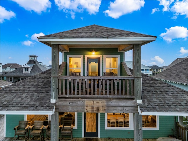 1317 Emerald Dr, Crystal Beach, TX 77650 - rear view of property featuring a shingled roof