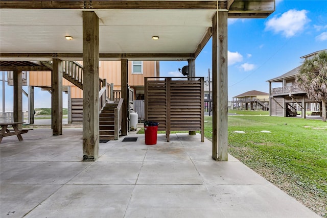 1317 Emerald Dr, Crystal Beach, TX 77650 - view of patio / terrace featuring stairway