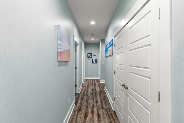 1317 Emerald Dr, Crystal Beach, TX 77650 - hall with recessed lighting, baseboards, and dark wood finished floors
