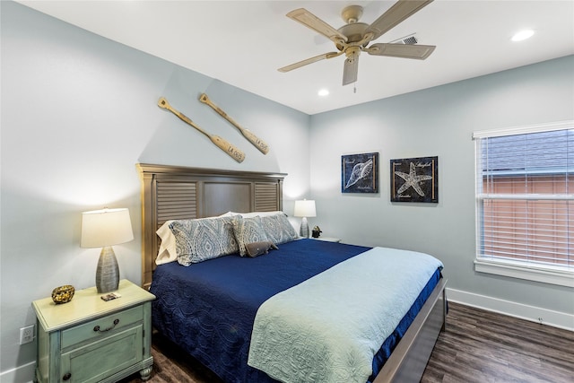1317 Emerald Dr, Crystal Beach, TX 77650 - bedroom with dark wood-style flooring, baseboards, a ceiling fan, and recessed lighting
