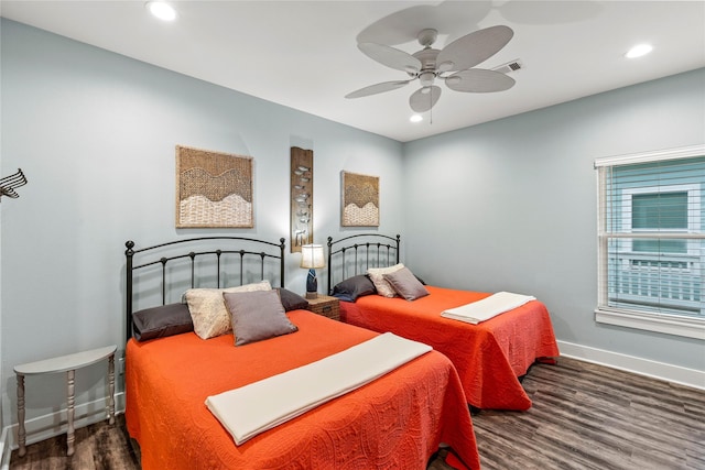 1317 Emerald Dr, Crystal Beach, TX 77650 - bedroom with wood finished floors, baseboards, recessed lighting, and a ceiling fan