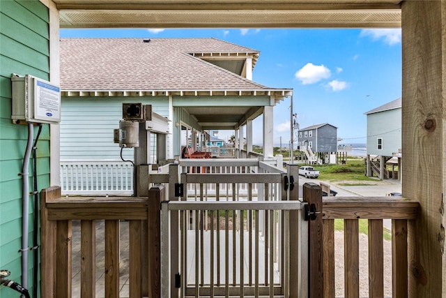 1317 Emerald Dr, Crystal Beach, TX 77650 - wooden deck featuring a gate