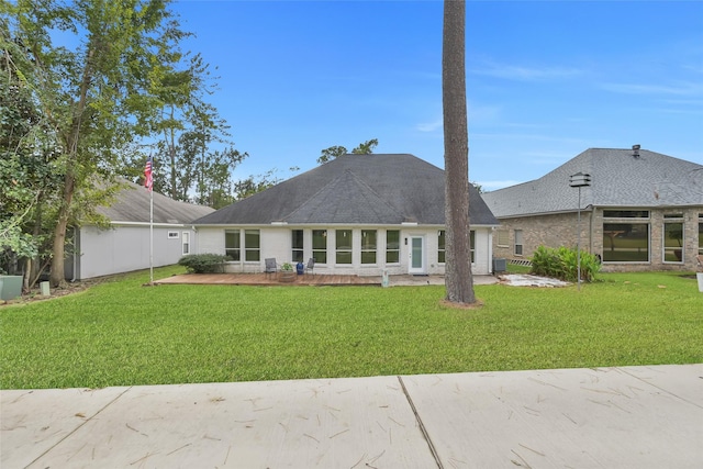 13646 Leafy Arbor Dr, Montgomery, TX 77356 - back of house with a lawn and a patio area