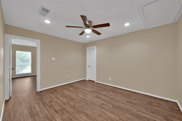 13646 Leafy Arbor Dr, Montgomery, TX 77356 - unfurnished room featuring attic access, baseboards, wood finished floors, ceiling fan, and recessed lighting