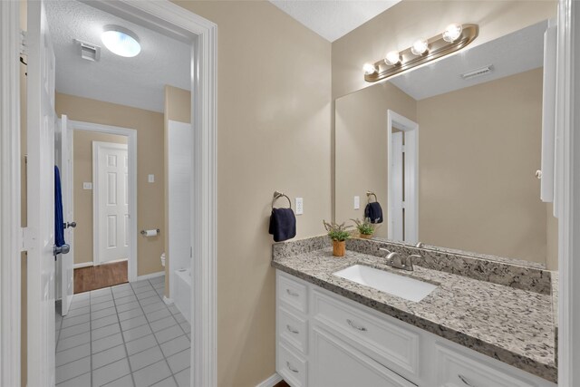 13646 Leafy Arbor Dr, Montgomery, TX 77356 - full bath featuring vanity, tile patterned floors, and baseboards