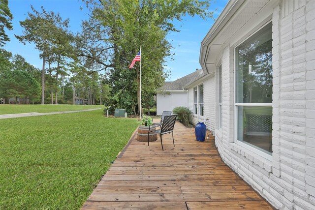 13646 Leafy Arbor Dr, Montgomery, TX 77356 - deck featuring a yard