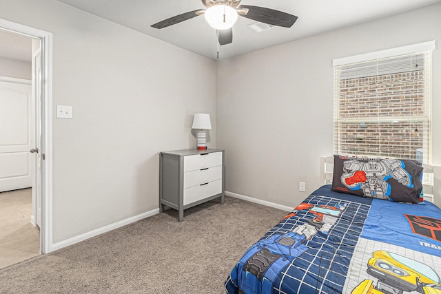 23722 Willow Haven Dr, Spring, TX 77389 - bedroom with light colored carpet, baseboards, and a ceiling fan