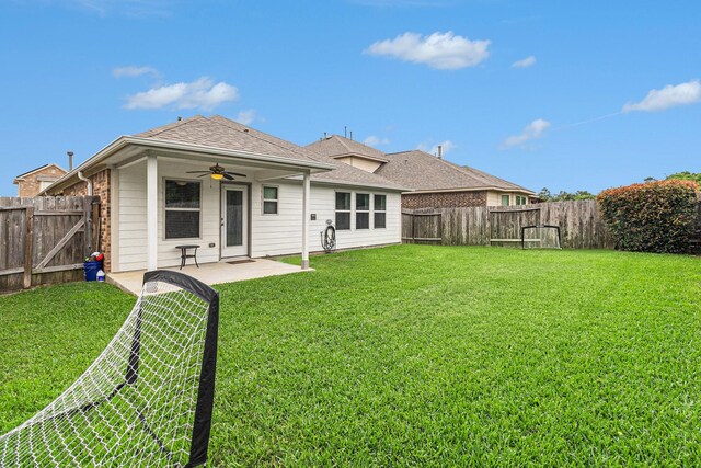 23722 Willow Haven Dr, Spring, TX 77389 - back of property featuring a ceiling fan, a patio, and roof with shingles