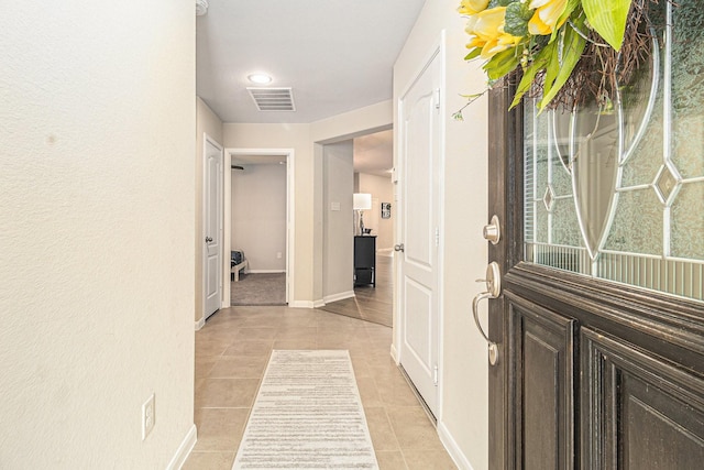 23722 Willow Haven Dr, Spring, TX 77389 - foyer featuring light tile patterned floors and baseboards