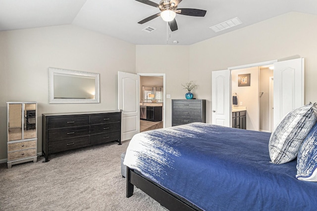 23722 Willow Haven Dr, Spring, TX 77389 - bedroom with lofted ceiling, connected bathroom, light carpet, and ceiling fan