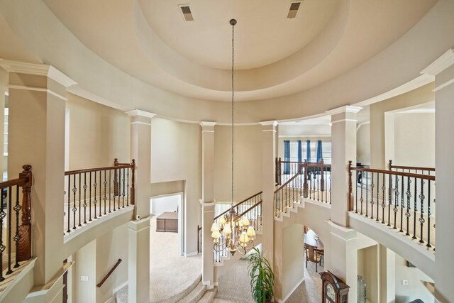 8314 Kelsey Pass, Missouri City, TX 77459 - corridor with an upstairs landing, a high ceiling, decorative columns, and carpet floors