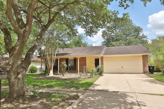3903 Coltwood Dr, Spring, TX 77388 - ranch-style house featuring brick siding, concrete driveway, an attached garage, and roof with shingles