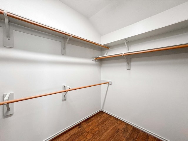 15319 Ochre Leaf Trl, Cypress, TX 77433 - spacious closet with wood finished floors and lofted ceiling