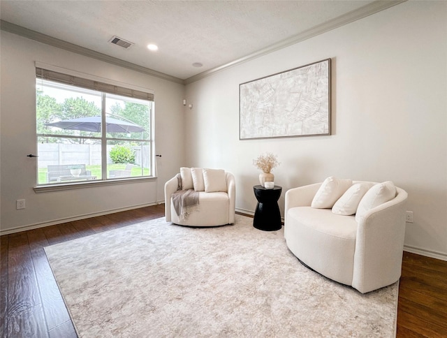 15319 Ochre Leaf Trl, Cypress, TX 77433 - living area featuring crown molding, wood finished floors, and baseboards