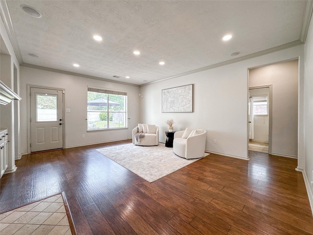 15319 Ochre Leaf Trl, Cypress, TX 77433 - living area featuring ornamental molding, hardwood / wood-style floors, baseboards, and recessed lighting