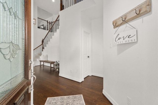 27121 Holtwood Grove Rd, Magnolia, TX 77354 - foyer featuring stairs, dark wood-style floors, baseboards, and a towering ceiling