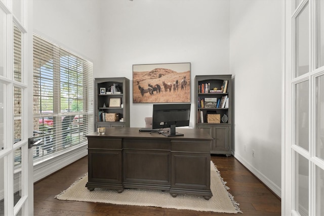 27121 Holtwood Grove Rd, Magnolia, TX 77354 - office featuring dark wood-type flooring, a high ceiling, and baseboards