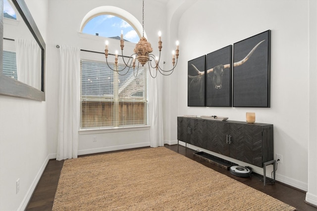 27121 Holtwood Grove Rd, Magnolia, TX 77354 - dining room featuring a chandelier, wood finished floors, and baseboards