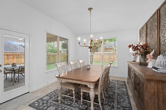 27121 Holtwood Grove Rd, Magnolia, TX 77354 - dining space with plenty of natural light, a chandelier, lofted ceiling, light tile patterned floors, and baseboards