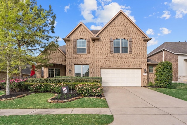 27121 Holtwood Grove Rd, Magnolia, TX 77354 - traditional home featuring brick siding, driveway, a garage, and a front yard