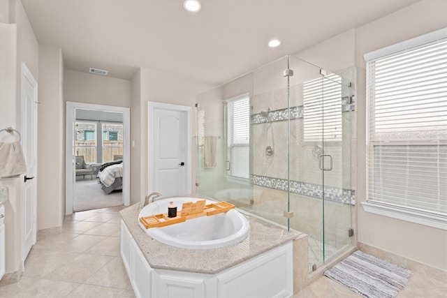 27121 Holtwood Grove Rd, Magnolia, TX 77354 - bathroom with connected bathroom, a garden tub, plenty of natural light, a stall shower, and recessed lighting
