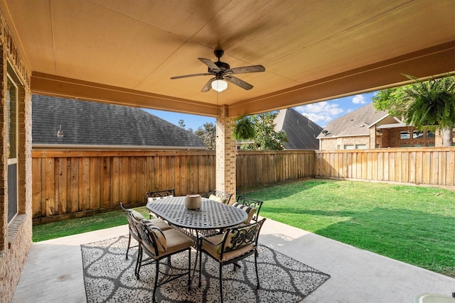 27121 Holtwood Grove Rd, Magnolia, TX 77354 - view of patio with ceiling fan and outdoor dining area