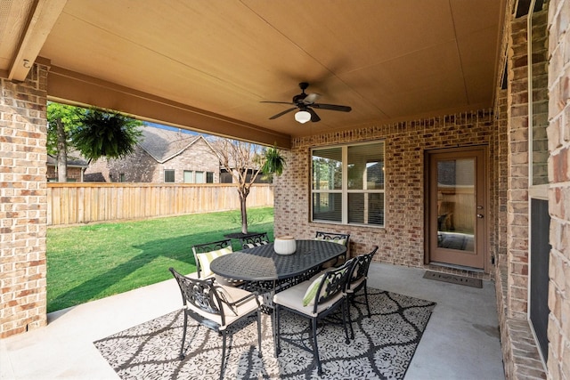 27121 Holtwood Grove Rd, Magnolia, TX 77354 - view of patio / terrace featuring ceiling fan and outdoor dining space