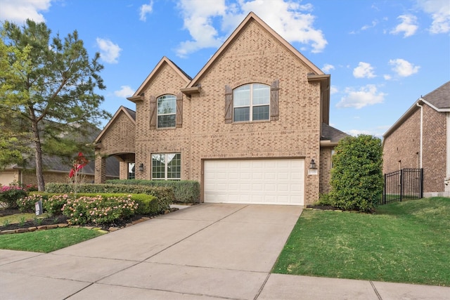 27121 Holtwood Grove Rd, Magnolia, TX 77354 - traditional-style home featuring brick siding, driveway, and an attached garage