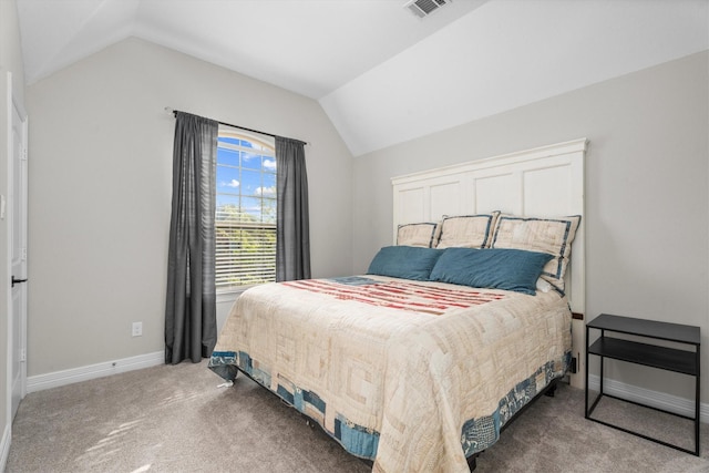 27121 Holtwood Grove Rd, Magnolia, TX 77354 - carpeted bedroom featuring vaulted ceiling and baseboards